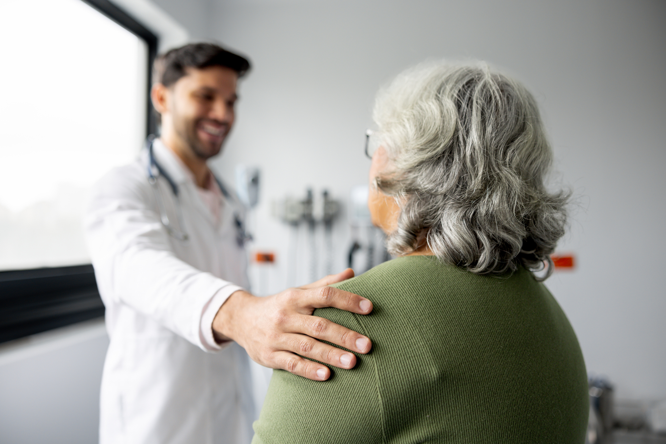 doctor speaking to patient